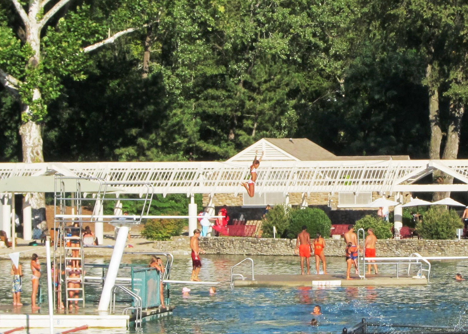 graydon pool kids on high dive low dive and 12 ft raft cropped